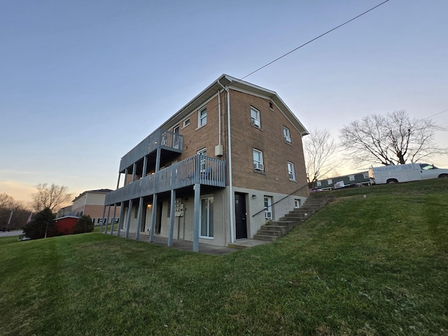 view of outdoor building at dusk