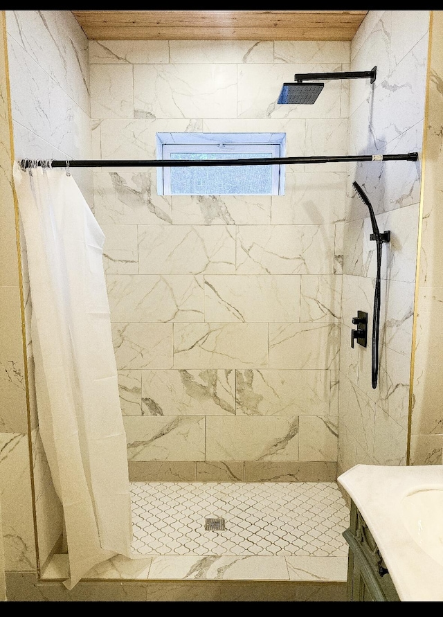 bathroom with vanity and a shower with shower curtain