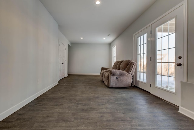 living area featuring dark hardwood / wood-style flooring