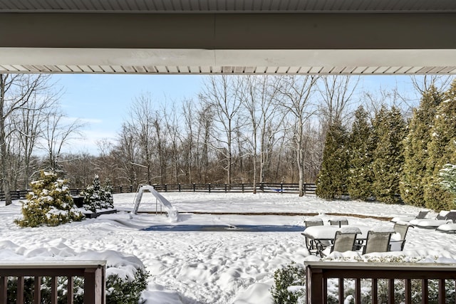 view of yard covered in snow