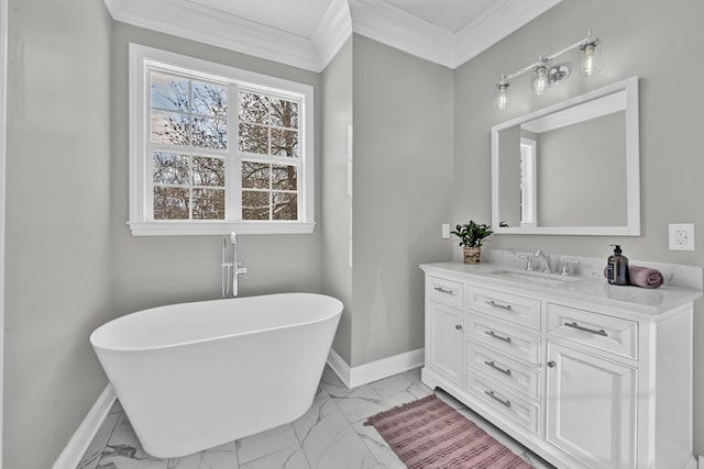 bathroom featuring vanity, ornamental molding, and a tub