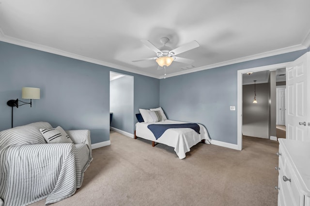 carpeted bedroom featuring ceiling fan and crown molding