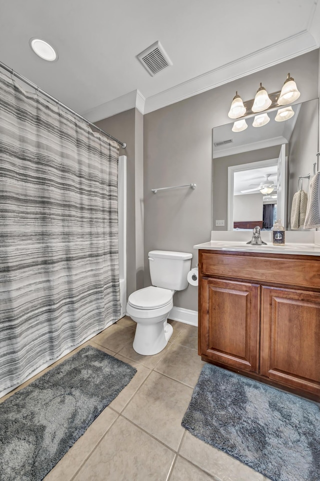 bathroom featuring vanity, tile patterned floors, crown molding, ceiling fan, and toilet