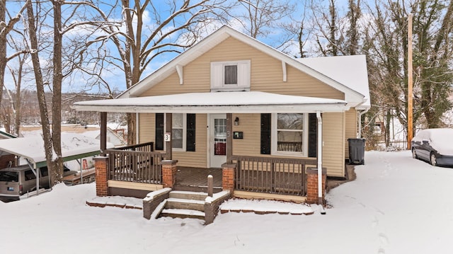 bungalow-style home featuring covered porch