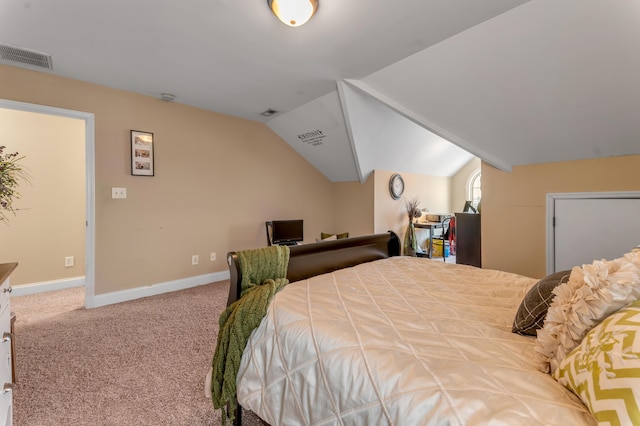 bedroom featuring carpet and lofted ceiling