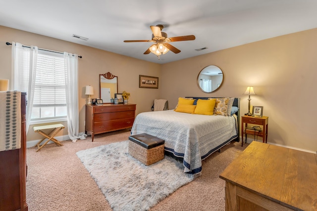 bedroom featuring ceiling fan and carpet floors