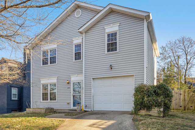 view of front of property featuring a garage