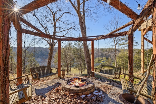 exterior space with a fire pit