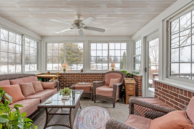 sunroom / solarium with wooden ceiling and ceiling fan