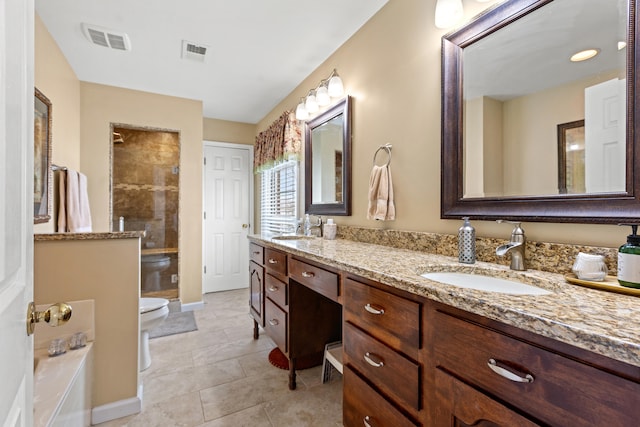 bathroom with toilet, tile patterned floors, walk in shower, and vanity