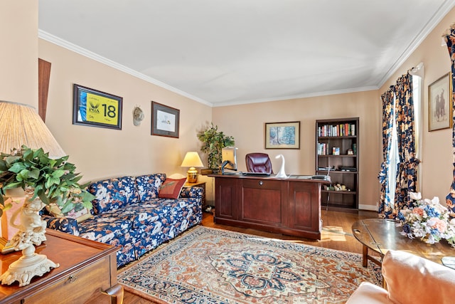 office space with light wood-type flooring and crown molding