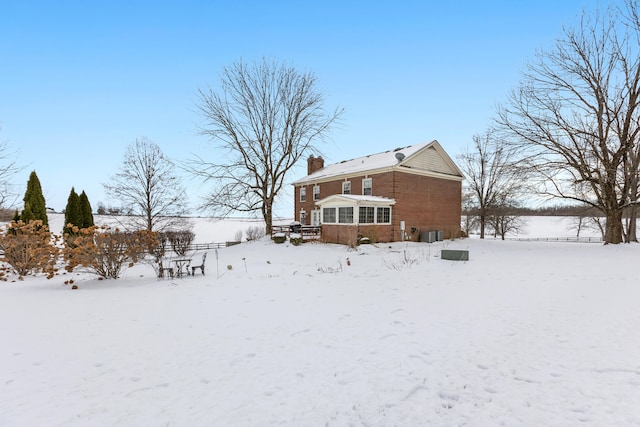 view of snow covered property