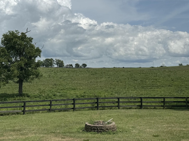 view of yard with a rural view