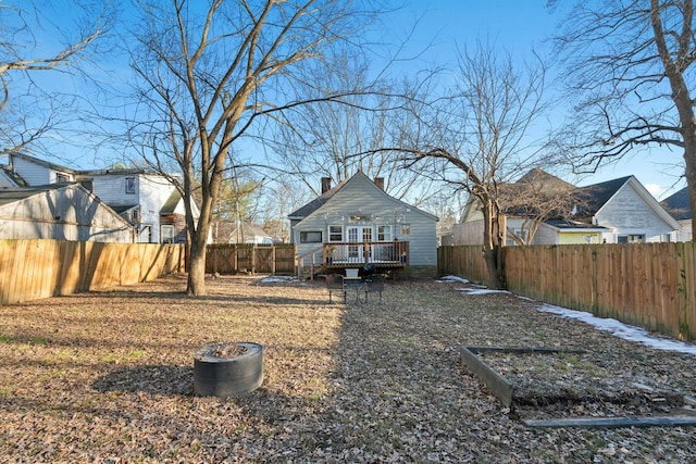 view of yard with a wooden deck