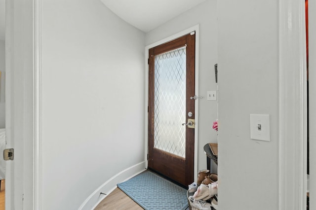 doorway to outside featuring hardwood / wood-style floors and a wealth of natural light