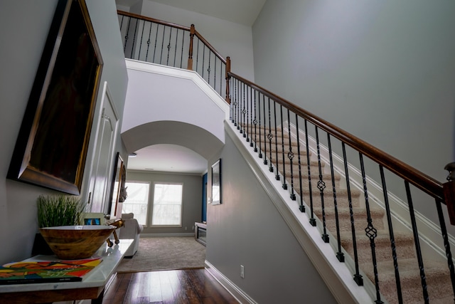 stairway with wood-type flooring