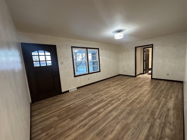 foyer with hardwood / wood-style flooring