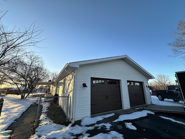 view of snow covered garage