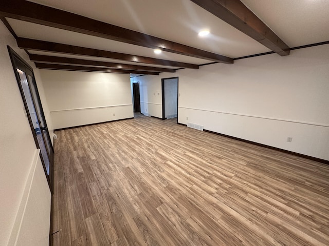 basement featuring light hardwood / wood-style floors