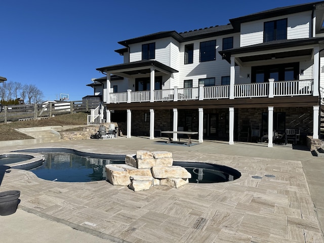 view of swimming pool featuring a patio area