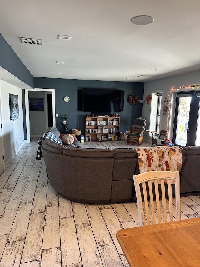 living room featuring light wood-type flooring