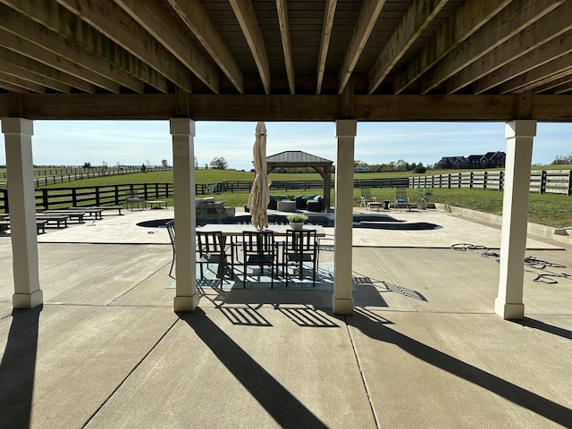 view of patio featuring a rural view and a gazebo