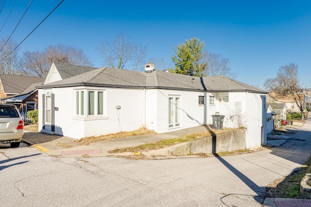 view of home's exterior featuring french doors