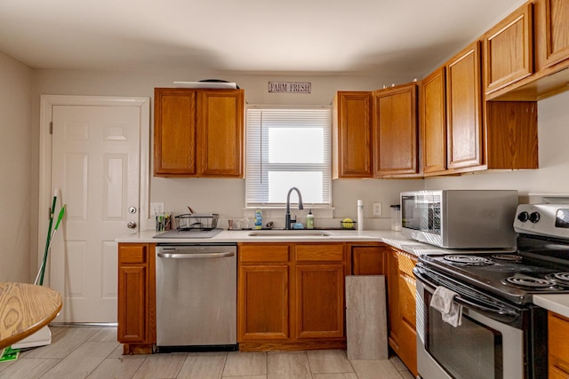 kitchen featuring sink and appliances with stainless steel finishes