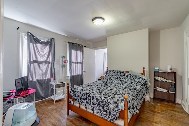 bedroom featuring hardwood / wood-style flooring