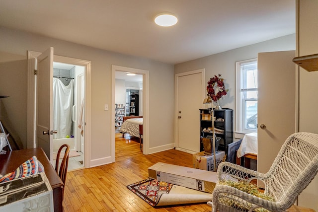 sitting room with light wood-type flooring