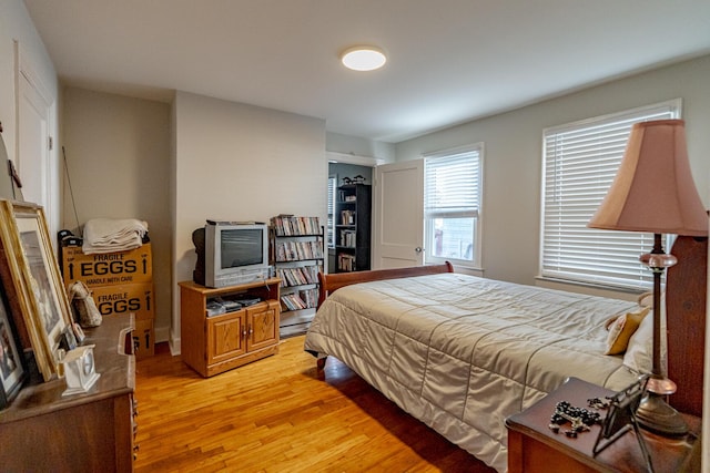 bedroom featuring light hardwood / wood-style floors