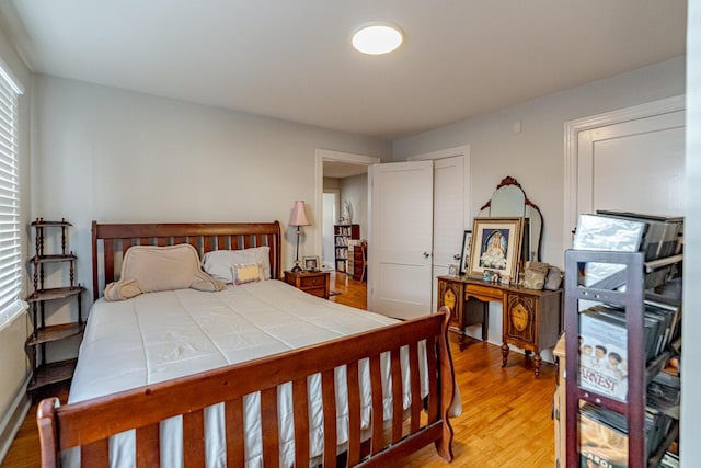 bedroom with light hardwood / wood-style flooring