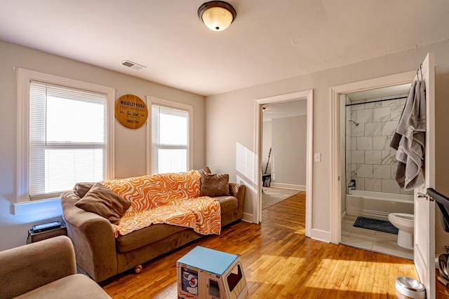 living room with light hardwood / wood-style floors