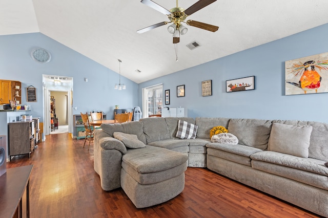 living room with vaulted ceiling, ceiling fan, and dark hardwood / wood-style flooring