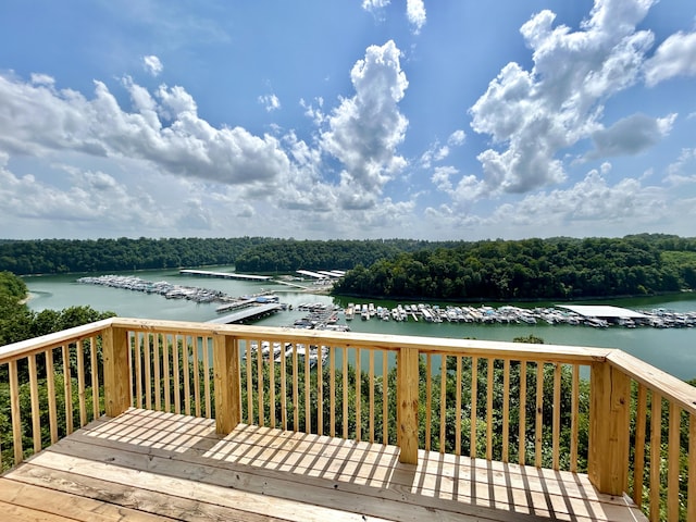 wooden terrace with a water view