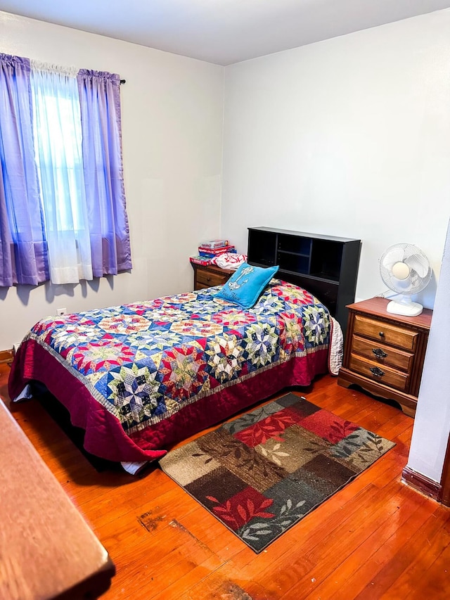 bedroom featuring hardwood / wood-style flooring