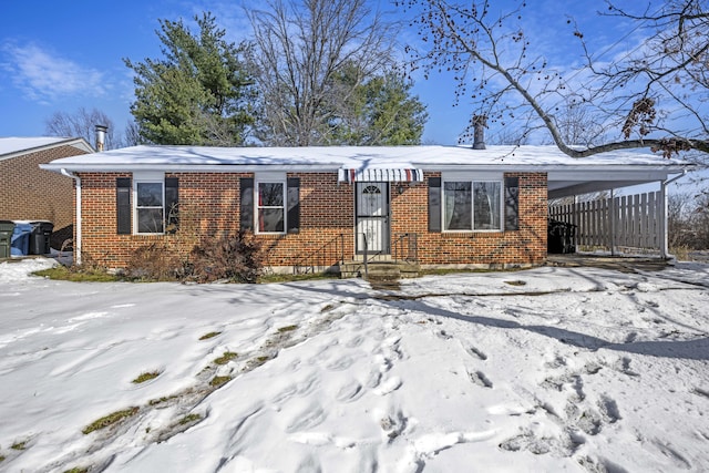 view of front of property with a carport