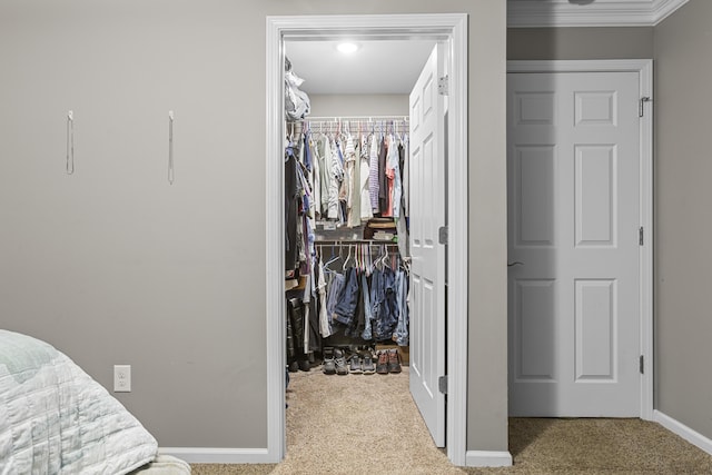 spacious closet featuring light carpet