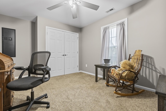 office space featuring ceiling fan and carpet floors