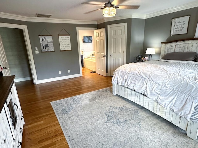 bedroom featuring ceiling fan, dark wood-type flooring, and ornamental molding