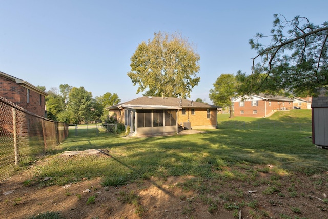 view of yard featuring a sunroom