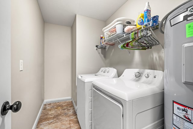 clothes washing area with electric water heater and washing machine and clothes dryer