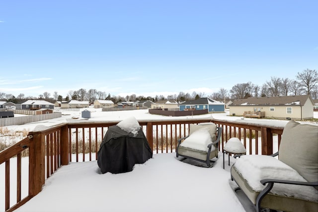 view of snow covered deck