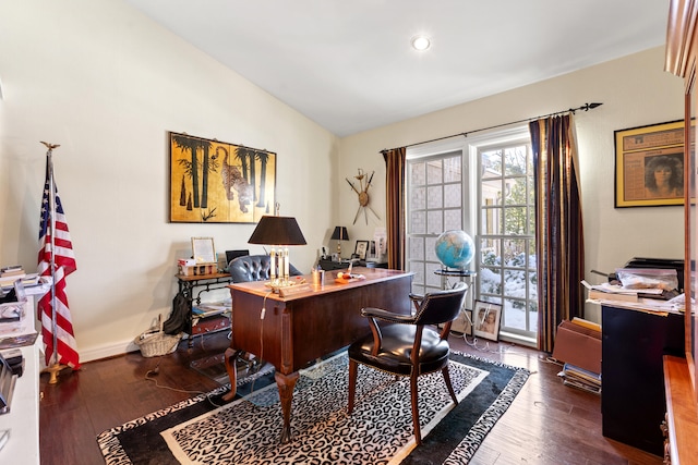 office featuring dark hardwood / wood-style flooring and lofted ceiling