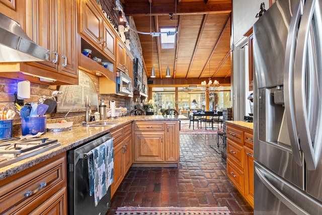 kitchen with wooden ceiling, a chandelier, appliances with stainless steel finishes, kitchen peninsula, and sink