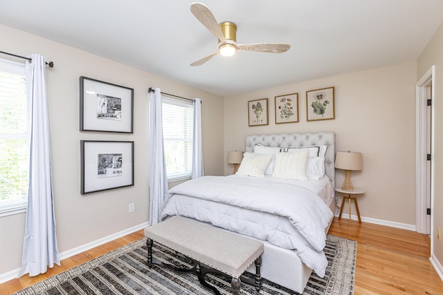 bedroom featuring ceiling fan and light hardwood / wood-style flooring