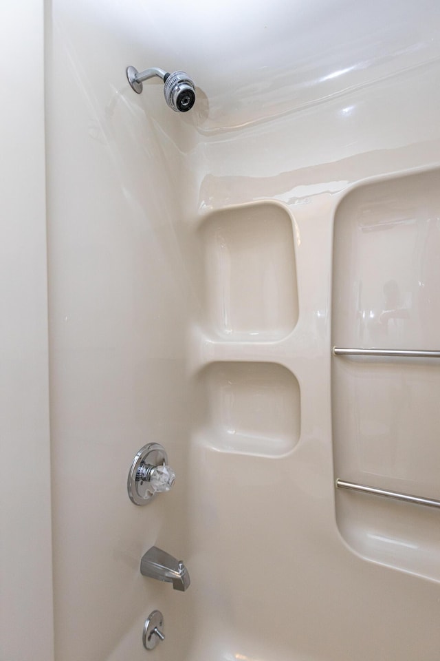 interior details with washtub / shower combination