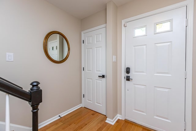 entrance foyer with light hardwood / wood-style floors