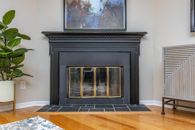 details with hardwood / wood-style flooring