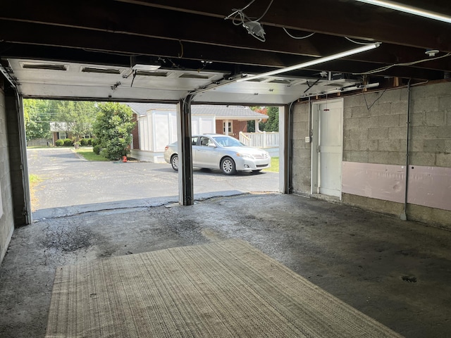 garage with a carport